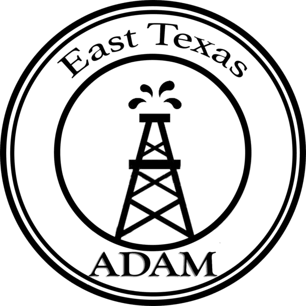 The logo of east texas adam with a tower in it.